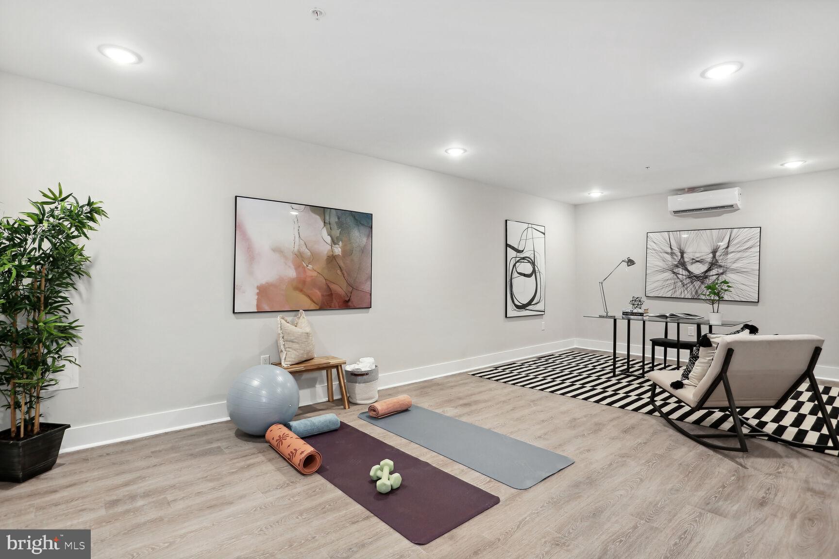 1236 Raum Street Northeast, Unit 12 Washington, DC 20002 - Photo 31 of 37 Downstairs Atelier staged as office and yoga room