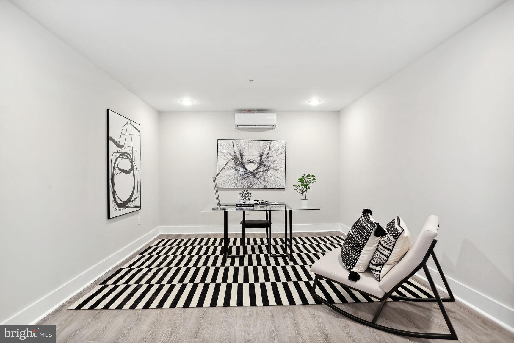 1236 Raum Street Northeast, Unit 12 Washington, DC 20002 - Photo 32 of 37 Downstairs Atelier staged as office and yoga room