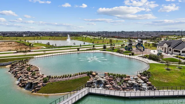a view of a swimming pool with a lake view