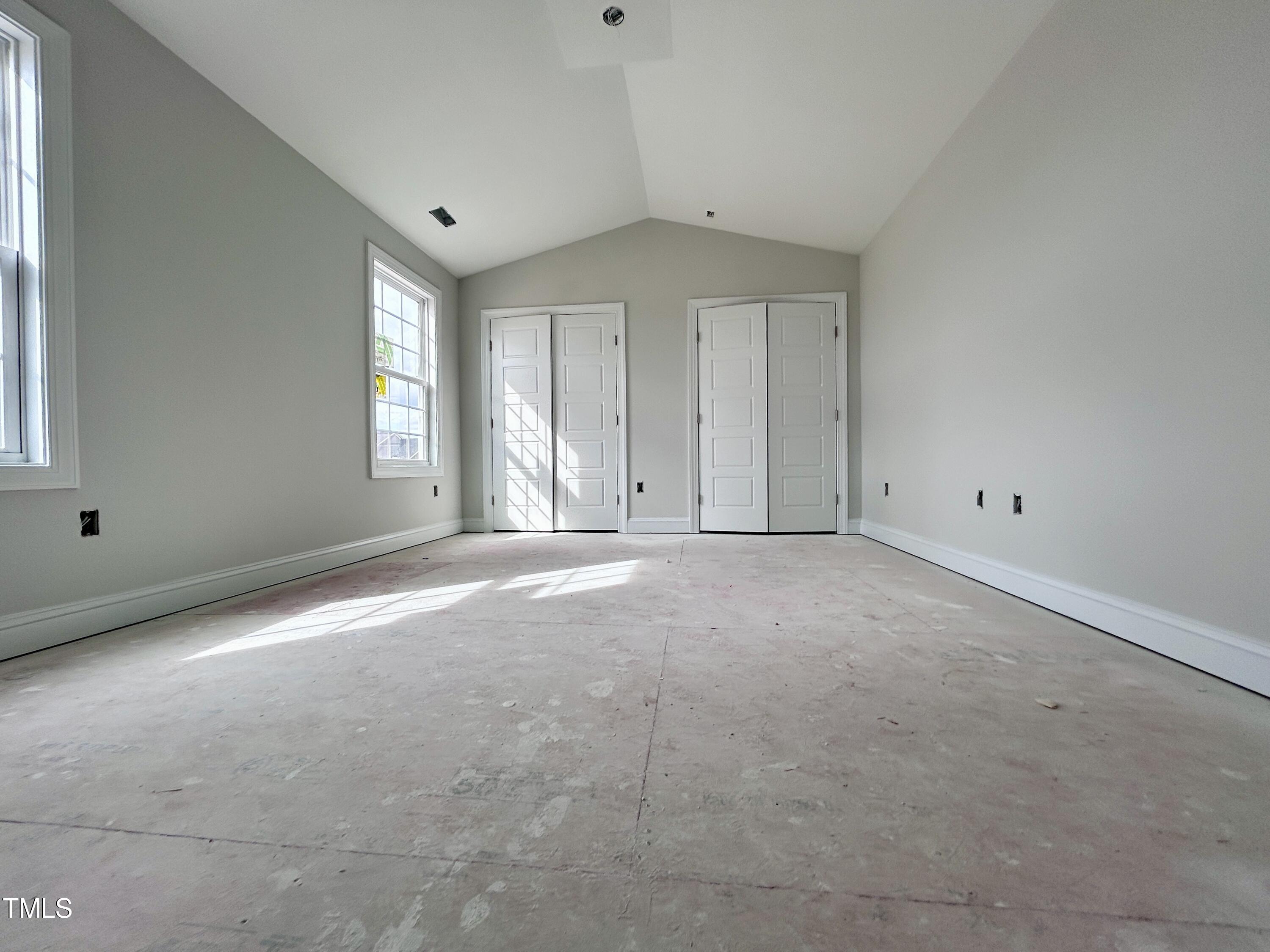 1208 Marsh Hawk Way Wake Forest, NC 27587 - Photo 4 of 11 a view of an empty room with a window