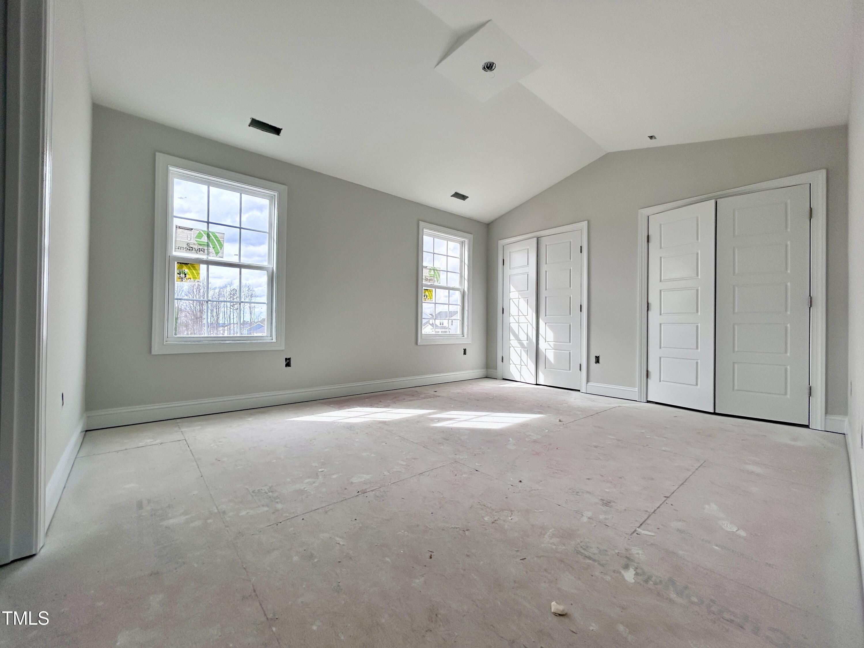 1208 Marsh Hawk Way Wake Forest, NC 27587 - Photo 5 of 11 an empty room with windows