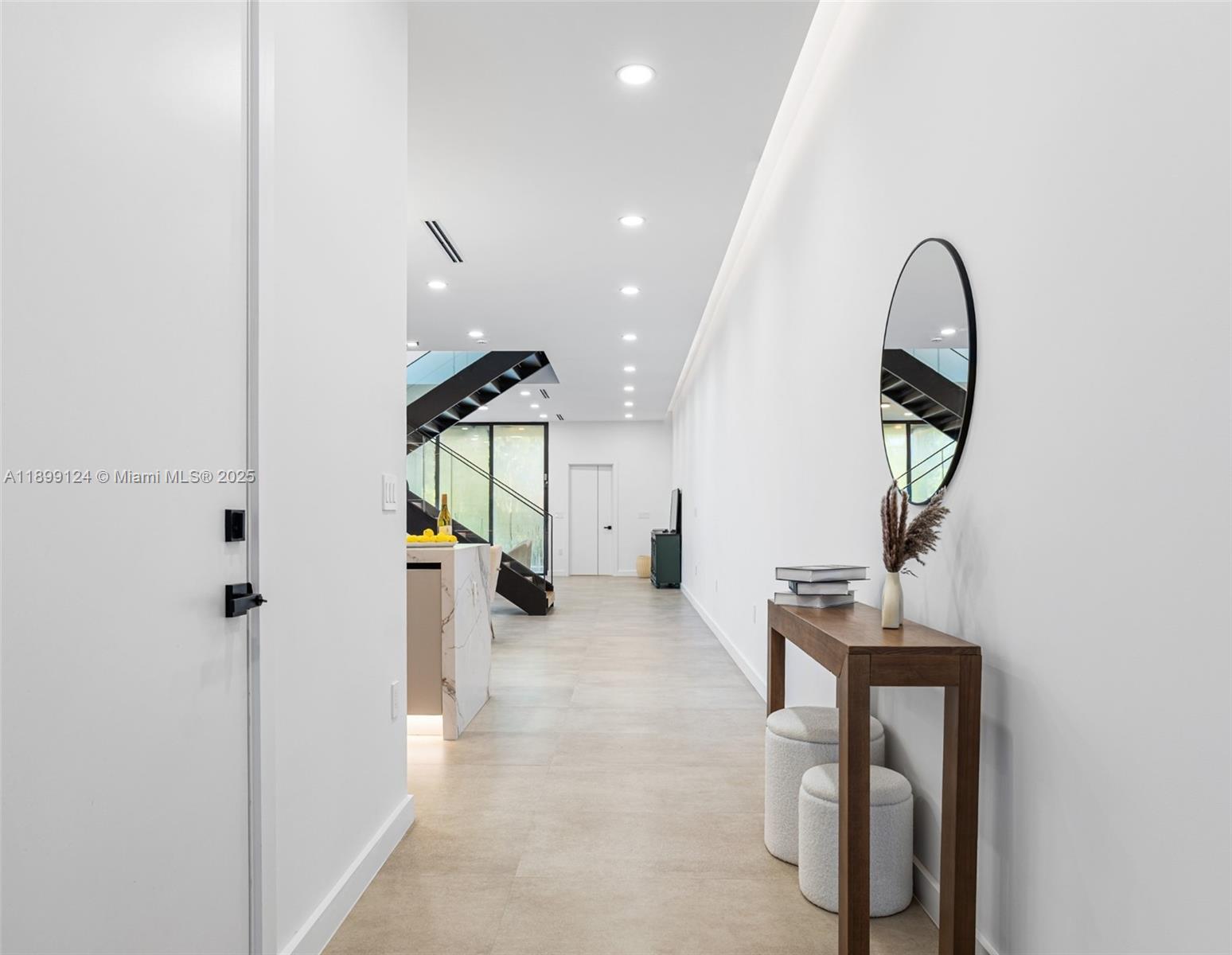 2823 Southwest 23rd Terrace, Unit 2823 Miami, FL 33145 - Photo 4 of 32 a view of entryway and hall