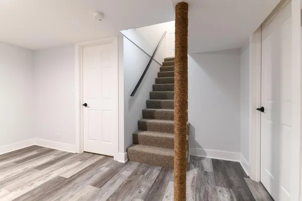 a view of entryway with wooden floor