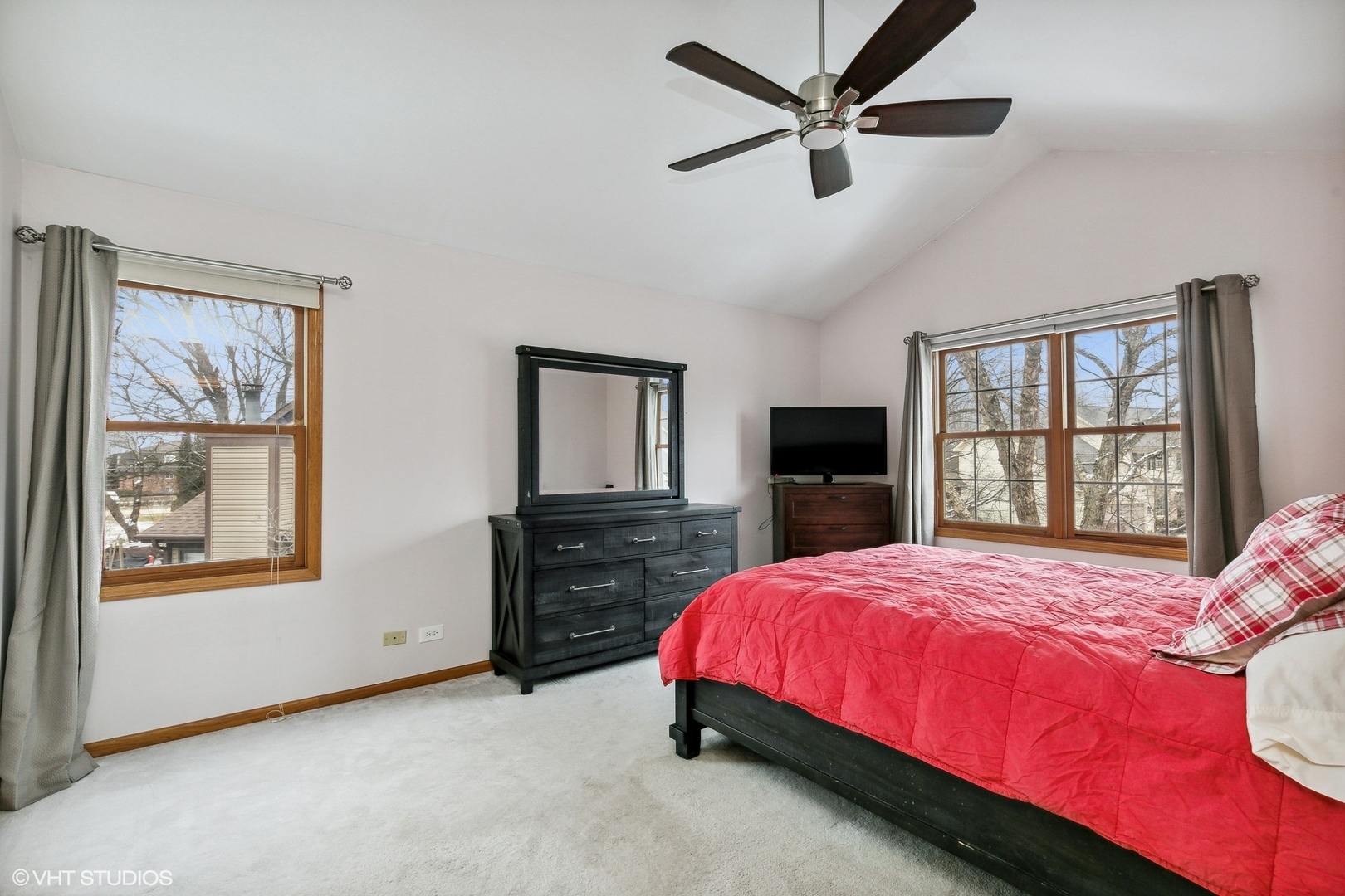 1101 Spring Creek Court Elgin, IL 60120 - Photo 11 of 18 a bedroom with a bed and a flat screen tv
