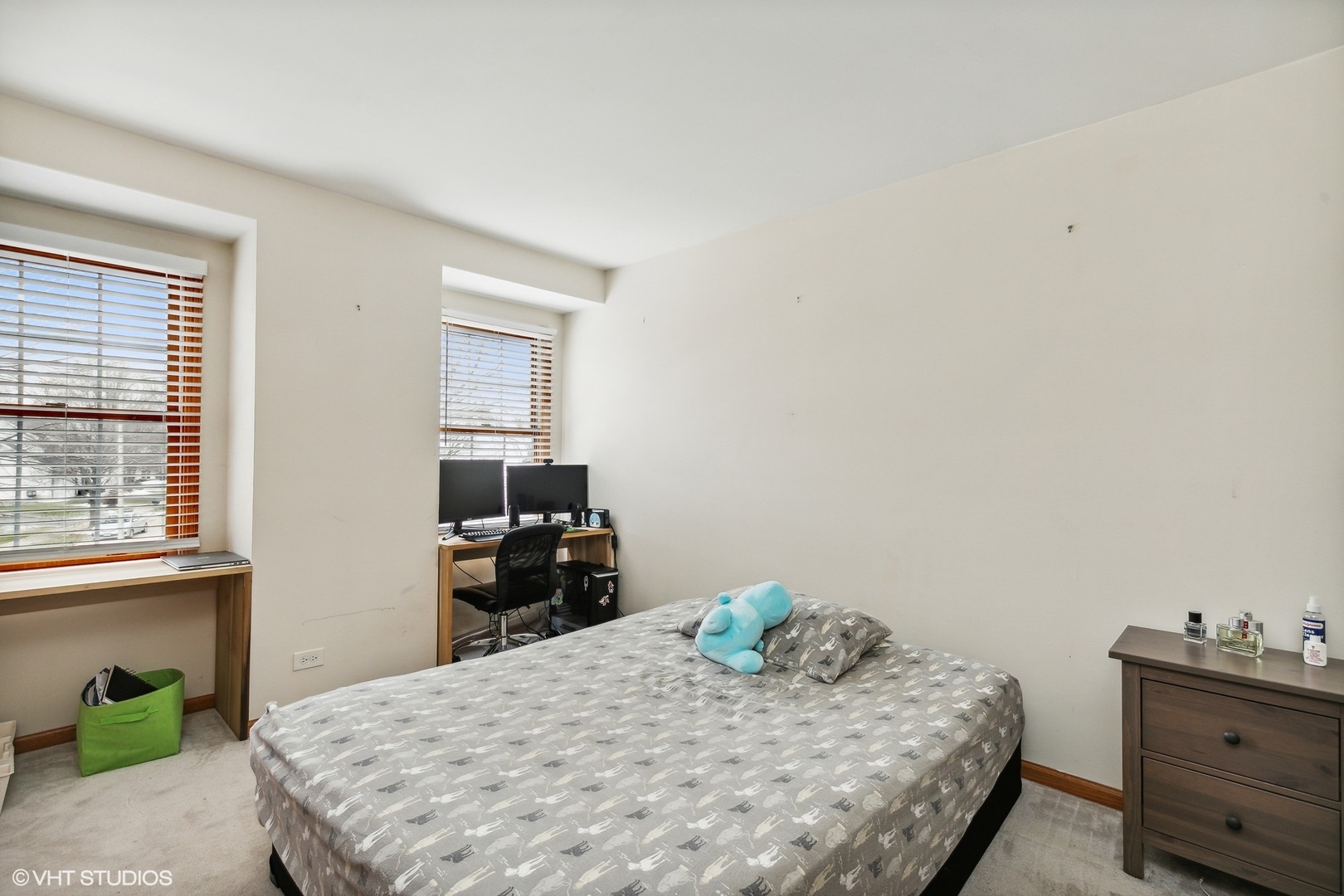 1101 Spring Creek Court Elgin, IL 60120 - Photo 14 of 18 a bedroom with a bed and dresser with window