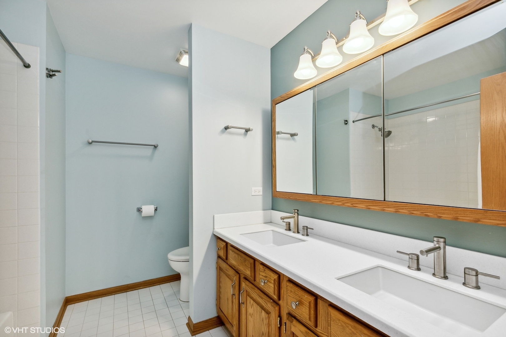 1101 Spring Creek Court Elgin, IL 60120 - Photo 16 of 18 a bathroom with a sink double vanity granite and a toilet