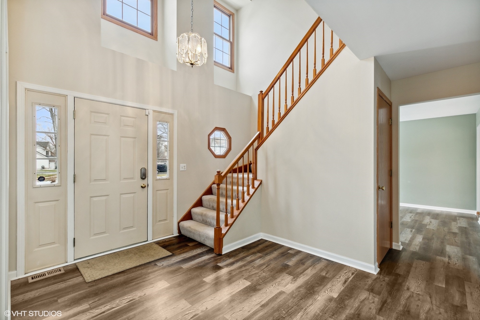 1101 Spring Creek Court Elgin, IL 60120 - Photo 2 of 18 a view of a hallway with staircase