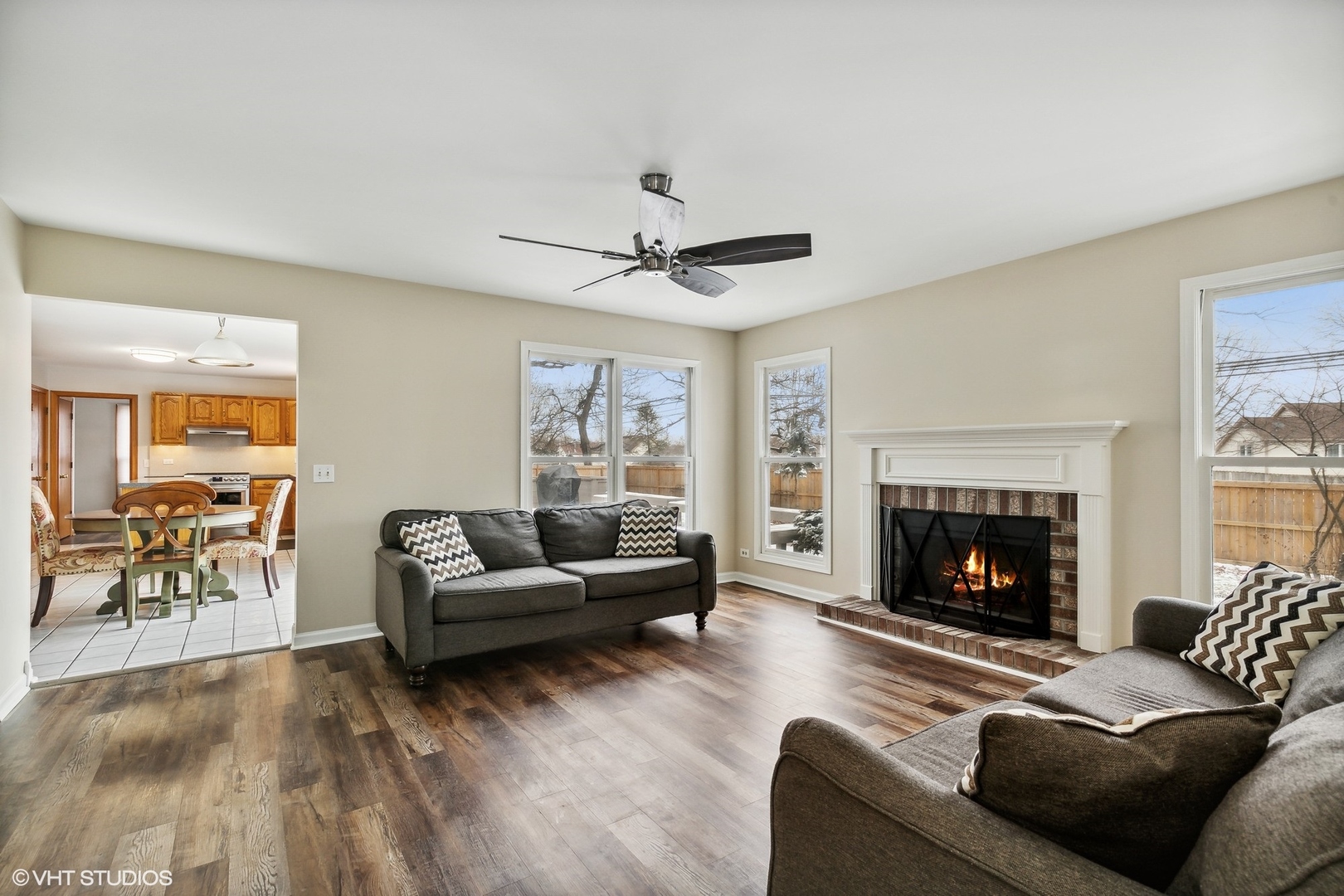 1101 Spring Creek Court Elgin, IL 60120 - Photo 3 of 18 a living room with furniture and a fireplace