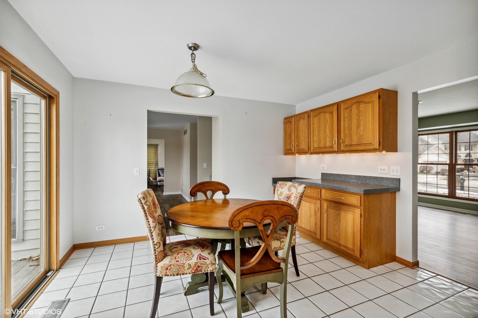 1101 Spring Creek Court Elgin, IL 60120 - Photo 9 of 18 a dining room with furniture and window