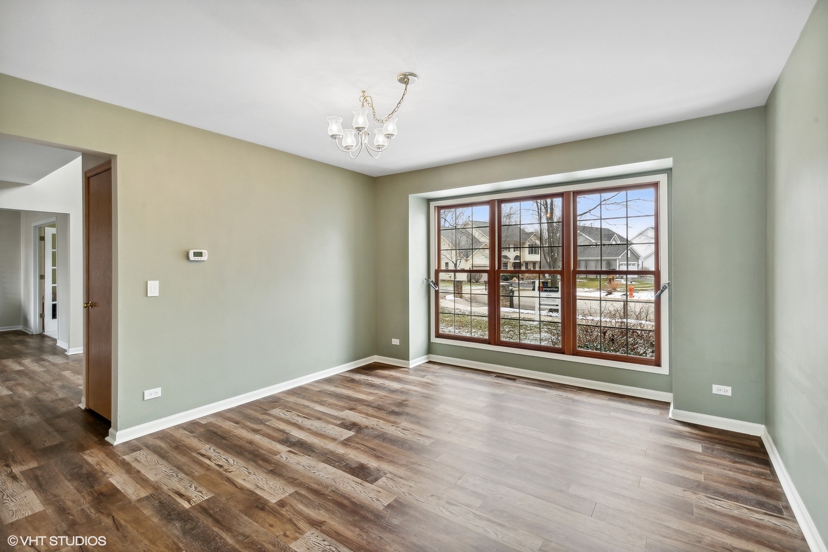 1101 Spring Creek Court Elgin, IL 60120 - Photo 10 of 18 a view of an empty room with a window