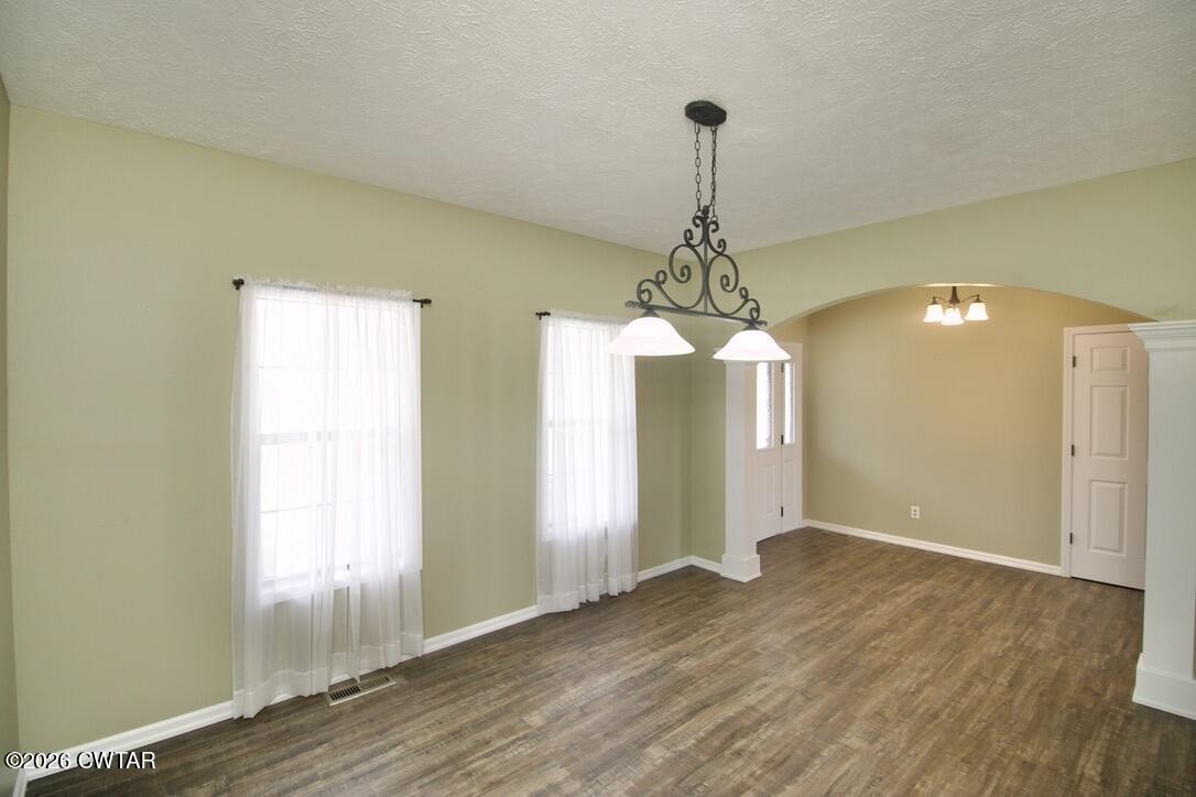 2845 Gilchrist Stantonville Road Stantonville, TN 38379 - Photo 14 of 97 a view of a room with wooden floor chandelier and entryway