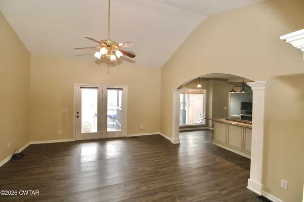 a kitchen with stainless steel appliances granite countertop a stove and a refrigerator