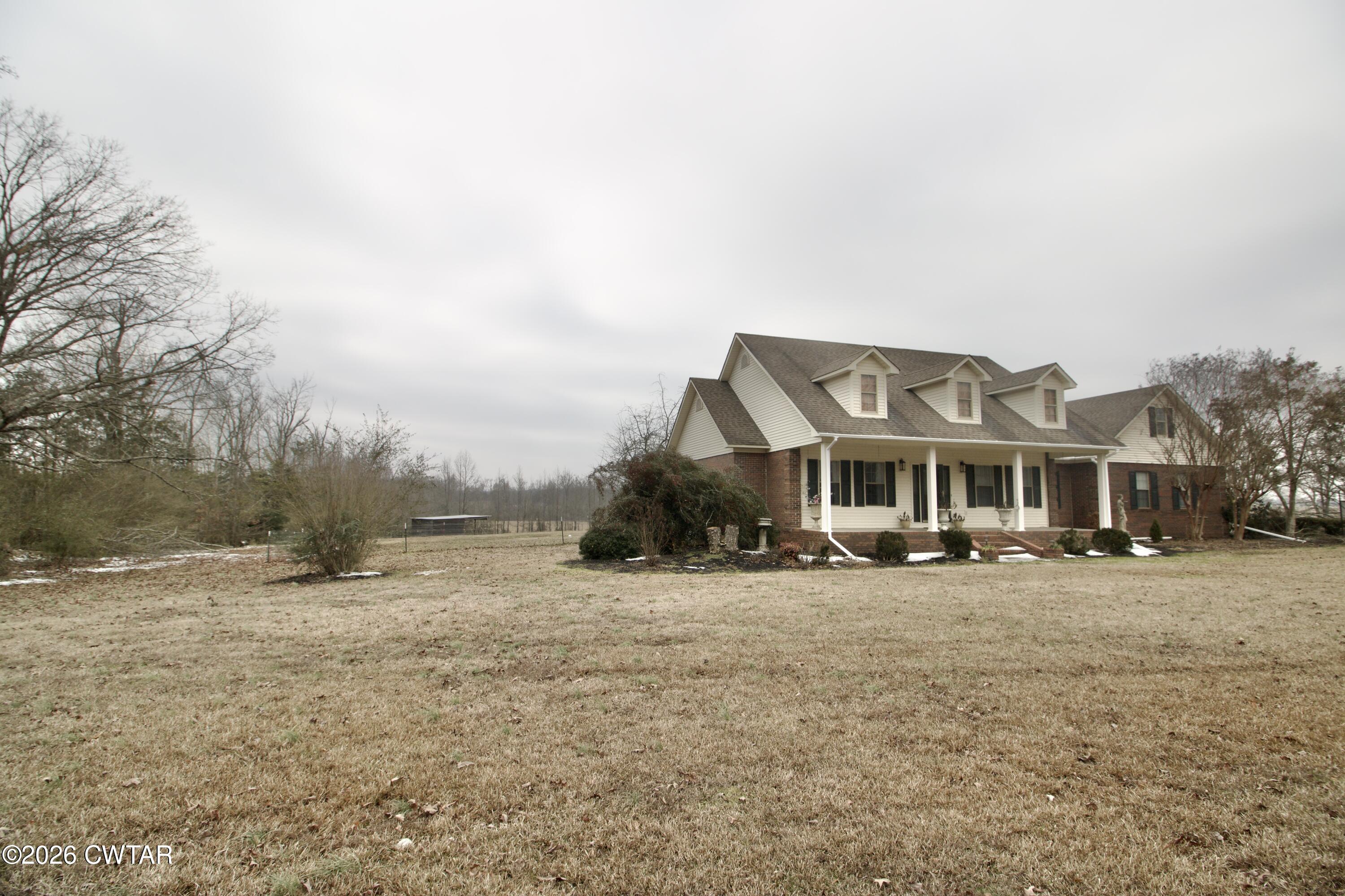 2845 Gilchrist Stantonville Road Stantonville, TN 38379 - Photo 2 of 97 a big house with a big yard and large trees