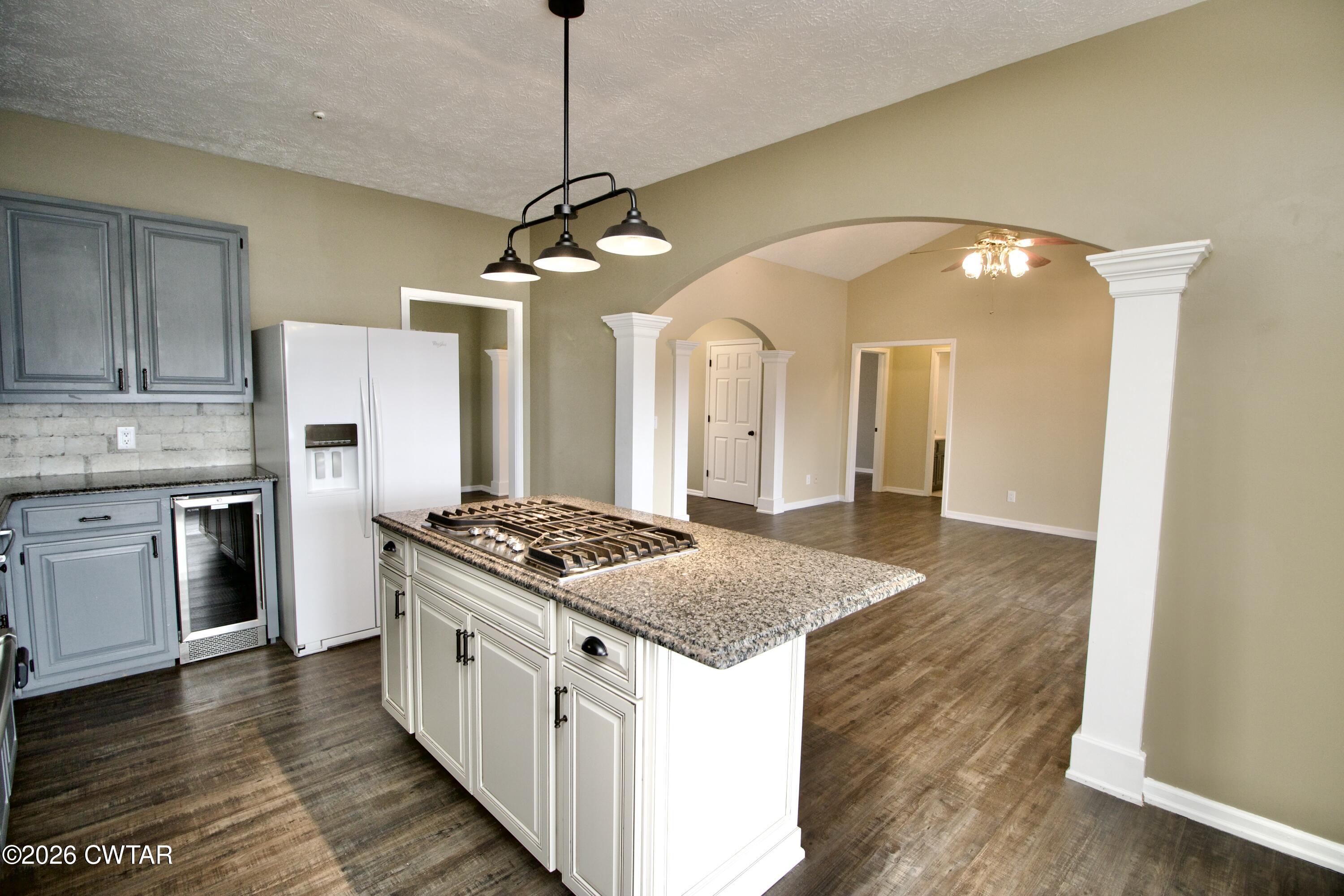2845 Gilchrist Stantonville Road Stantonville, TN 38379 - Photo 26 of 97 a kitchen with stainless steel appliances granite countertop a stove and a refrigerator