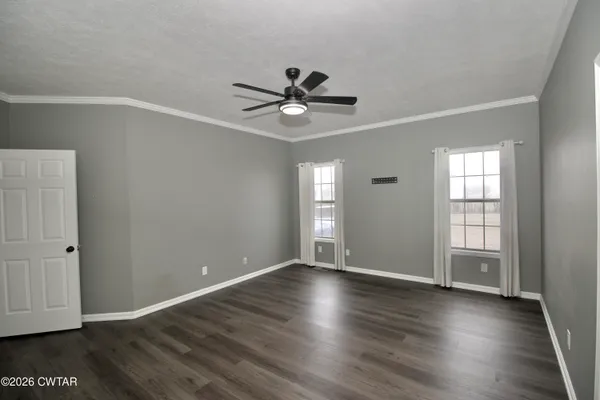 a view of utility room with windows