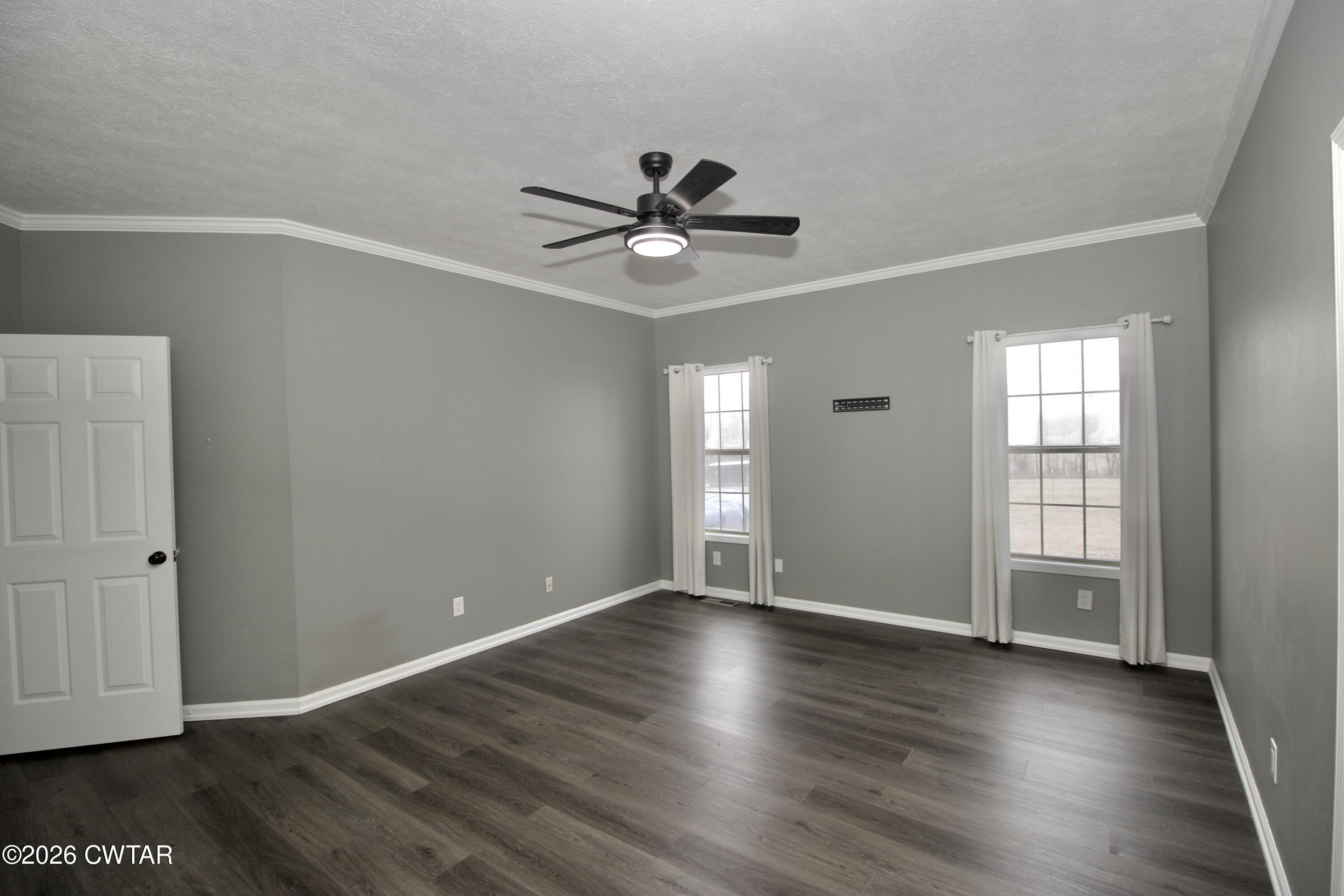 2845 Gilchrist Stantonville Road Stantonville, TN 38379 - Photo 30 of 97 wooden floor in an empty room with a window