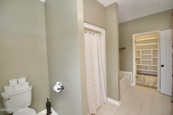 a view of a hallway with a outdoor space