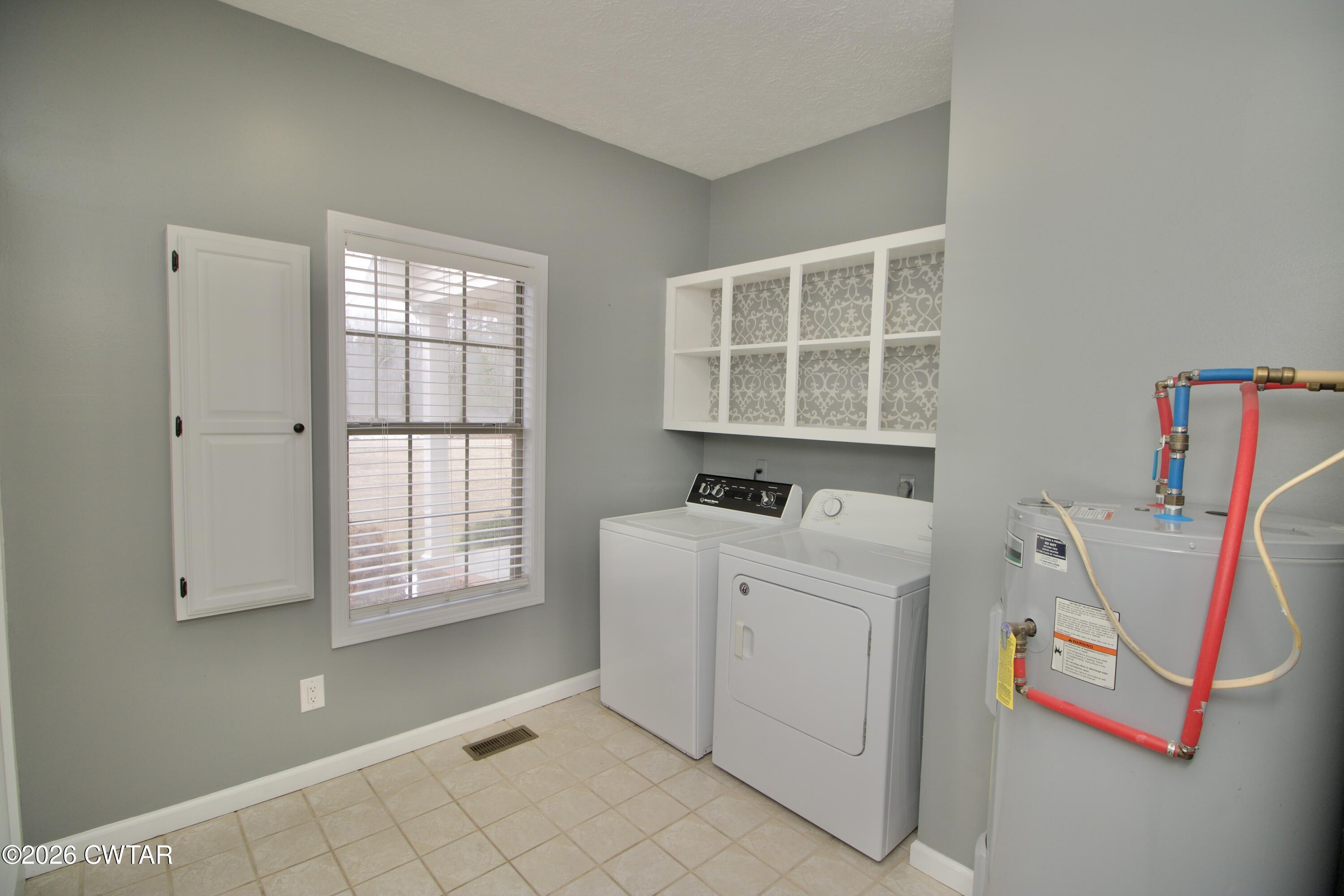 2845 Gilchrist Stantonville Road Stantonville, TN 38379 - Photo 47 of 97 a view of utility room with windows