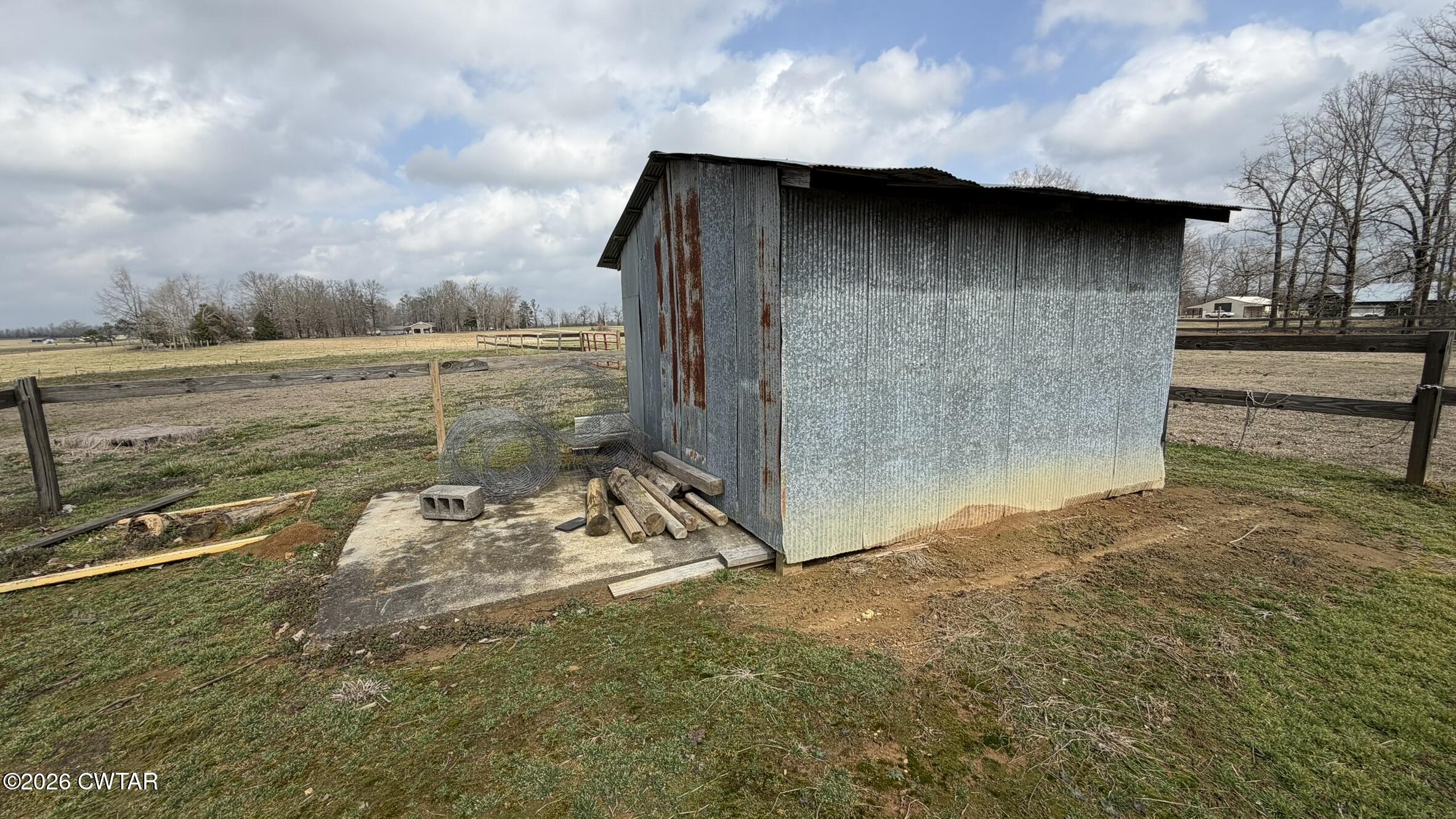 2845 Gilchrist Stantonville Road Stantonville, TN 38379 - Photo 94 of 97 a view of a wooden house with a yard