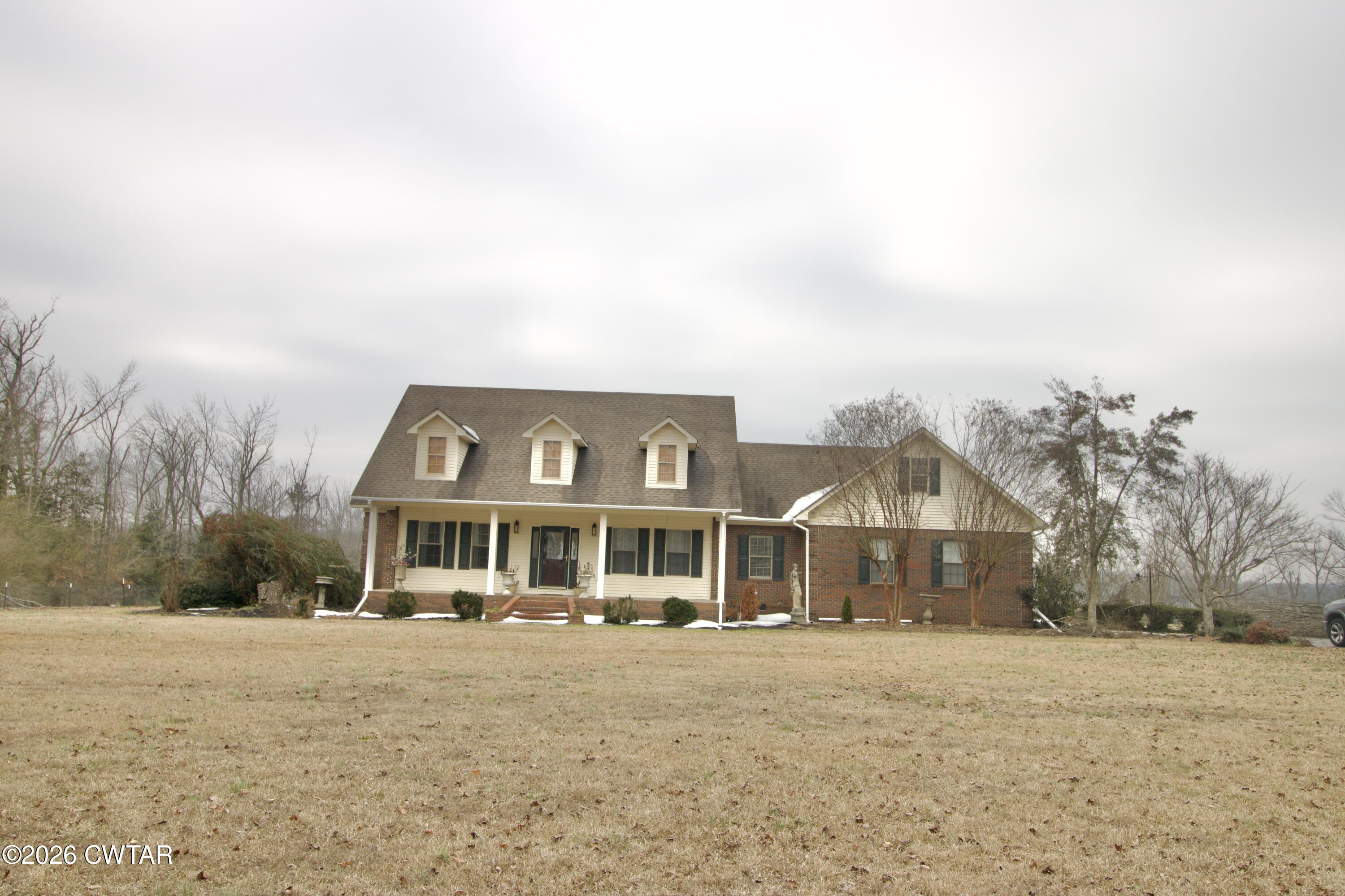 2845 Gilchrist Stantonville Road Stantonville, TN 38379 - Photo 10 of 97 a front view of a house with a yard