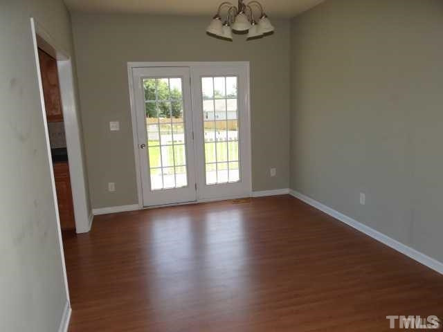 137 Glory Ridge Way Clayton, NC 27520 - Photo 9 of 17 Spacious Formal Dining Room leading out to Fully Fenced Backyard!
