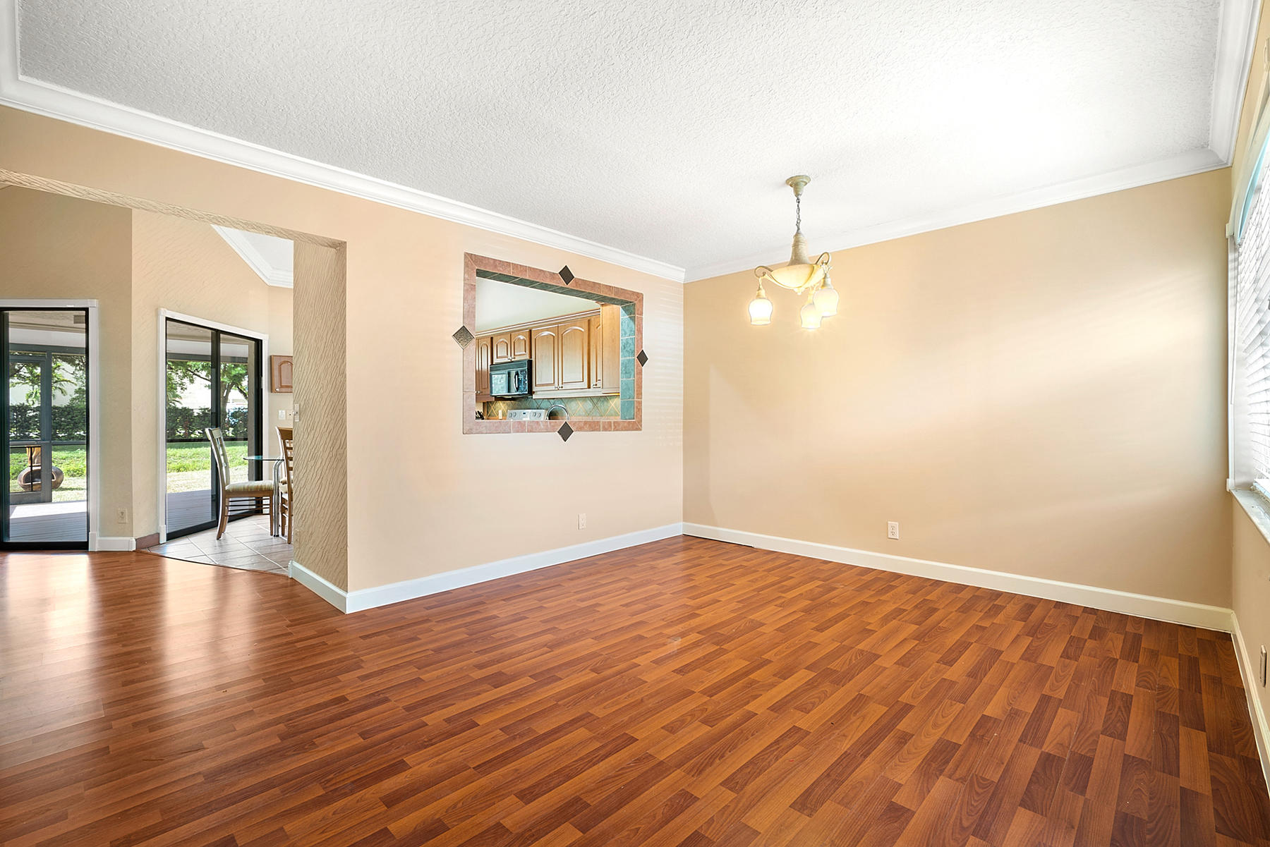 9350 Ketay Circle Boca Raton, FL 33428 - Photo 3 of 32 Dining Room w/Kitchen Pass Through