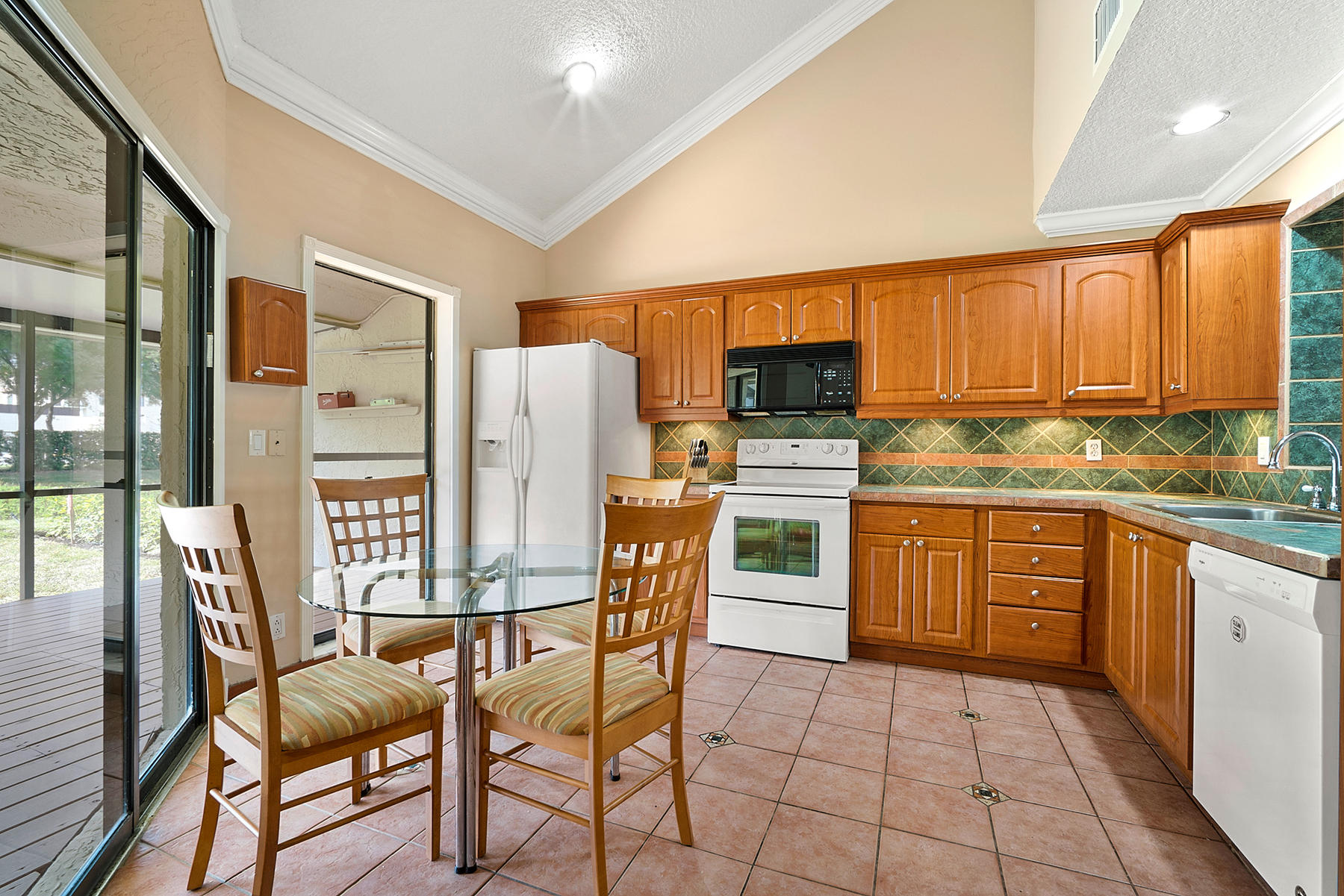 9350 Ketay Circle Boca Raton, FL 33428 - Photo 9 of 32 Vaulted Ceiling Kitchen Area