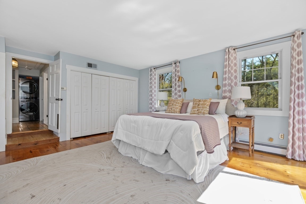 154 Topsfield Road Boxford, MA 01921 - Photo 13 of 39 a bedroom with a bed and a window