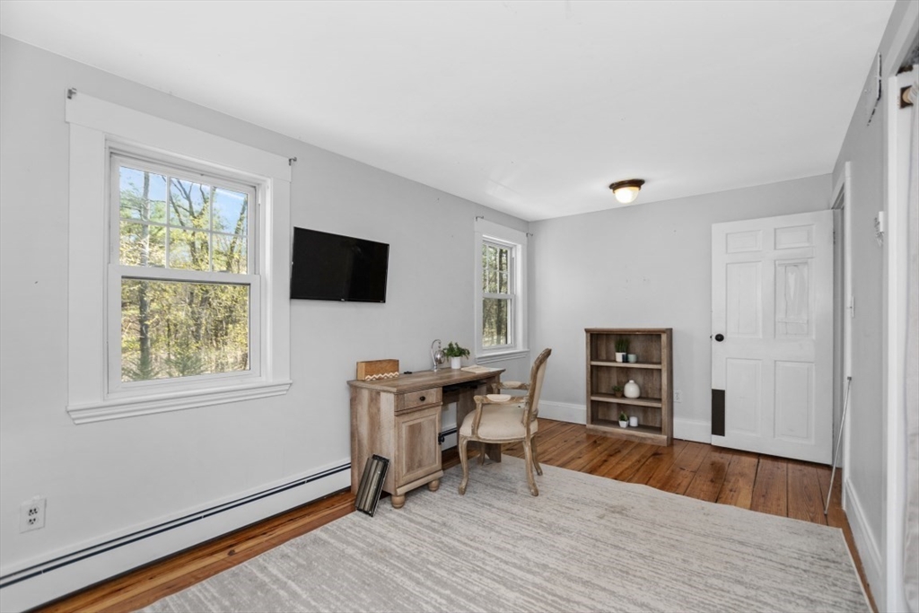 154 Topsfield Road Boxford, MA 01921 - Photo 17 of 39 a view of a workspace with furniture and a window