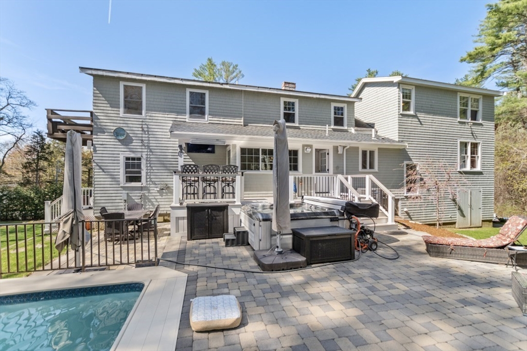 154 Topsfield Road Boxford, MA 01921 - Photo 20 of 39 a front view of a house with a yard