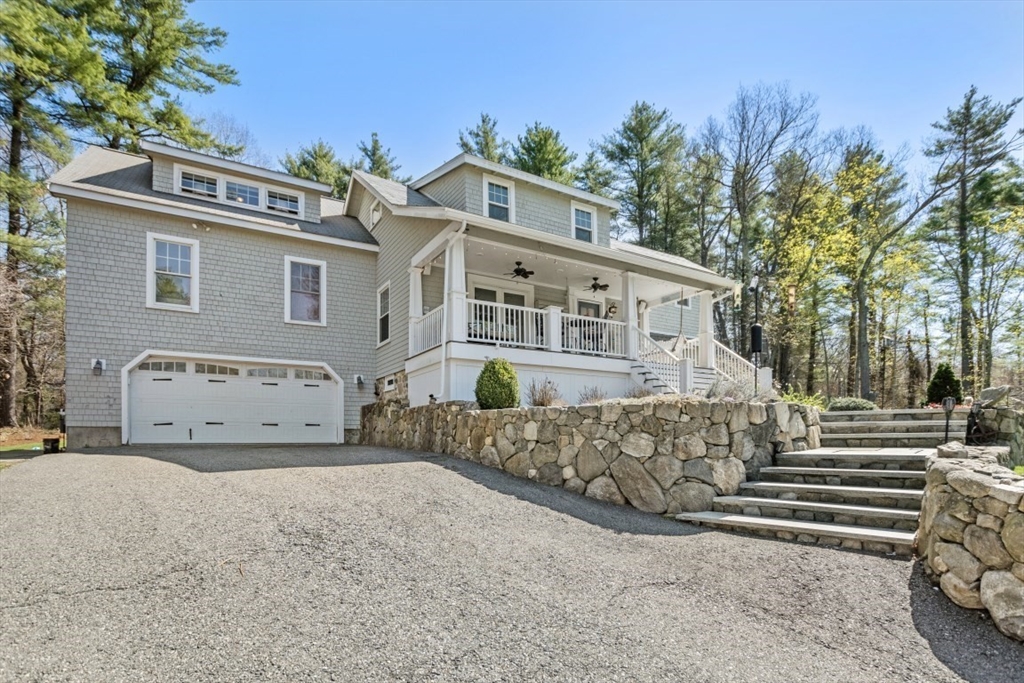 154 Topsfield Road Boxford, MA 01921 - Photo 29 of 39 a view of a house with a yard