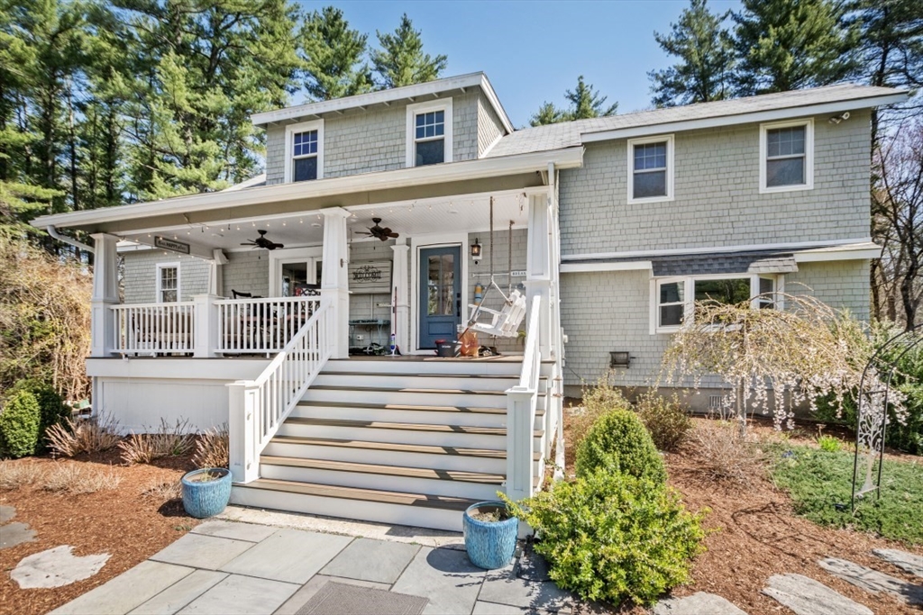 154 Topsfield Road Boxford, MA 01921 - Photo 30 of 39 a front view of a house with a porch