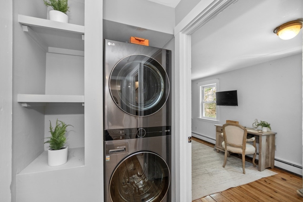 154 Topsfield Road Boxford, MA 01921 - Photo 33 of 39 a view of livingroom with washer and dryer