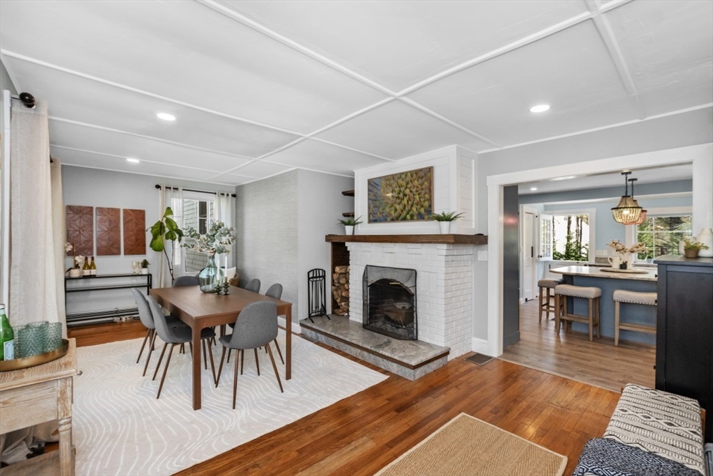 154 Topsfield Road Boxford, MA 01921 - Photo 5 of 39 a living room with furniture and a fireplace
