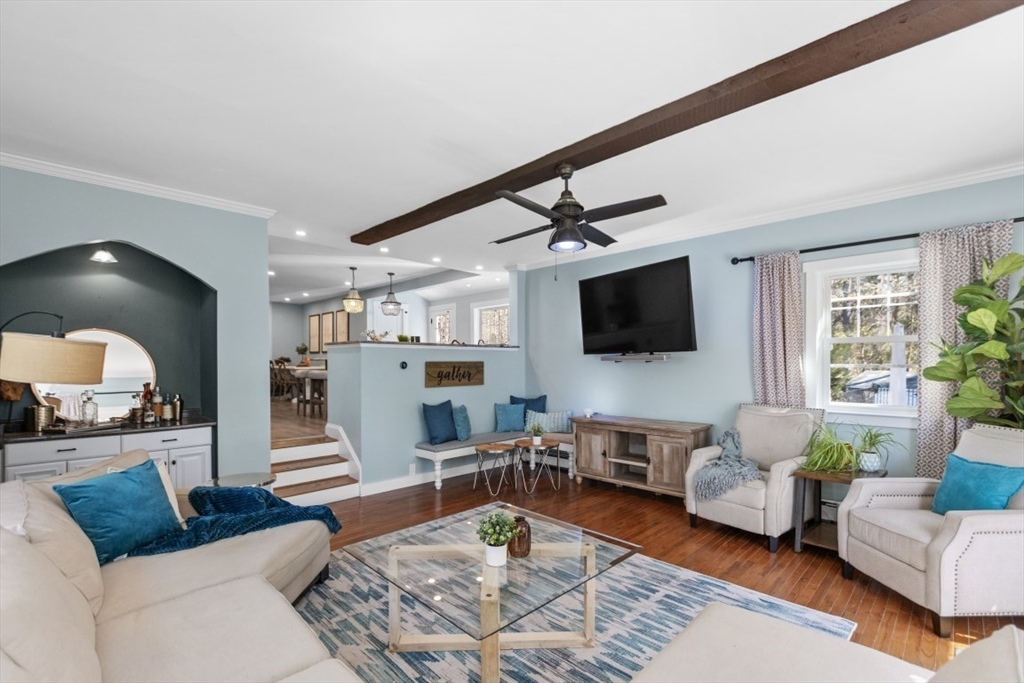 154 Topsfield Road Boxford, MA 01921 - Photo 6 of 39 a living room with furniture and a flat screen tv