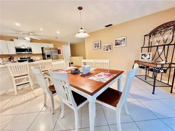 a view of a dining room with furniture