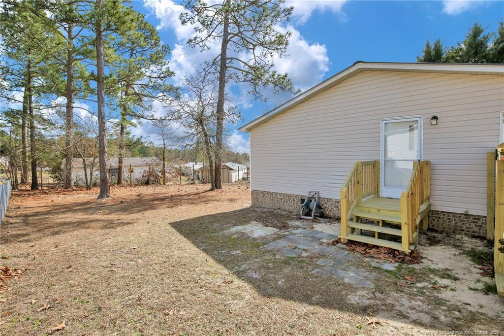 51 Old Forte Trail Spring Lake, NC 28390 - Photo 29 of 33 a view of a house with a yard