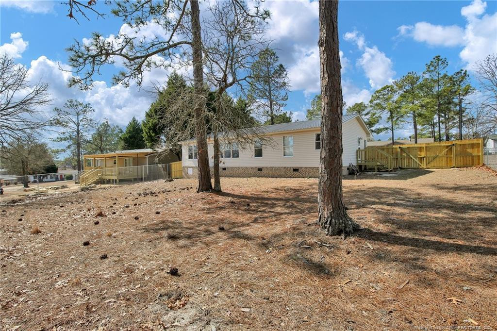 51 Old Forte Trail Spring Lake, NC 28390 - Photo 30 of 33 a view of a yard with a tree