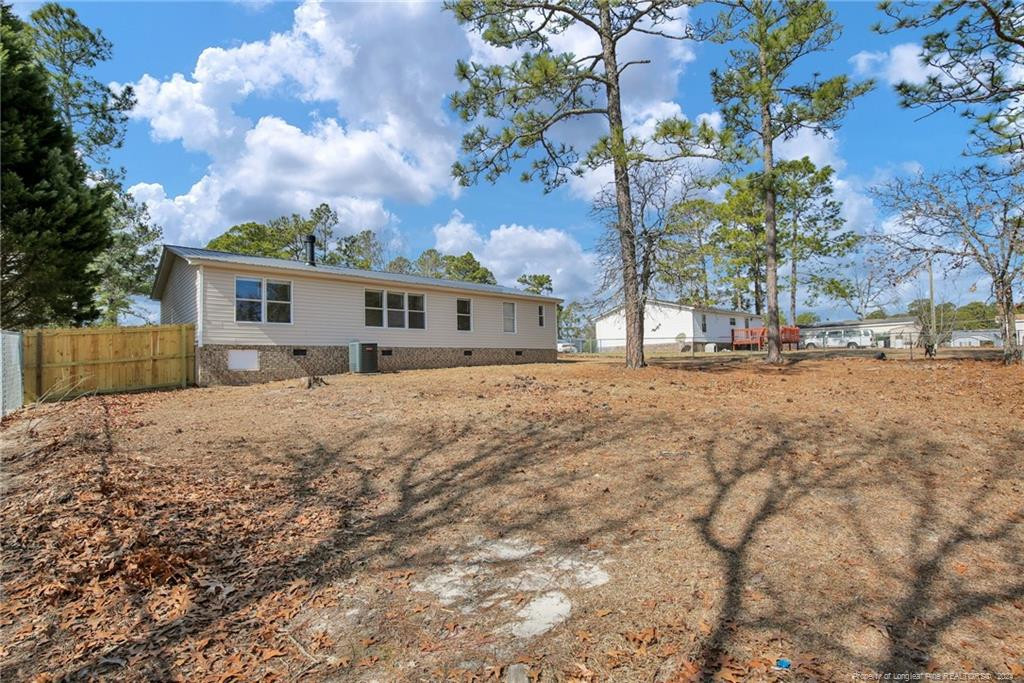 51 Old Forte Trail Spring Lake, NC 28390 - Photo 32 of 33 a view of house with a yard