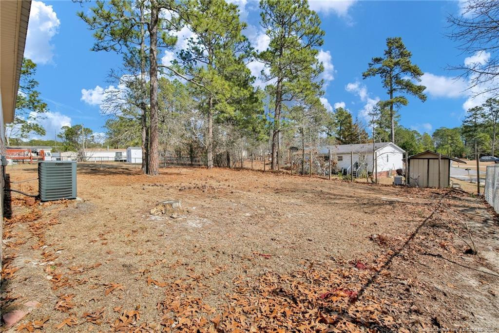 51 Old Forte Trail Spring Lake, NC 28390 - Photo 33 of 33 a row of white house with a outdoor space