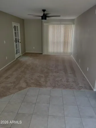 a kitchen with white cabinets