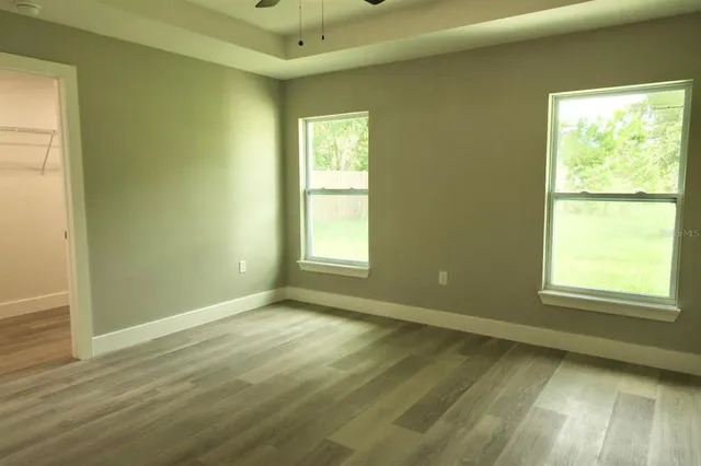 a view of an empty room and window