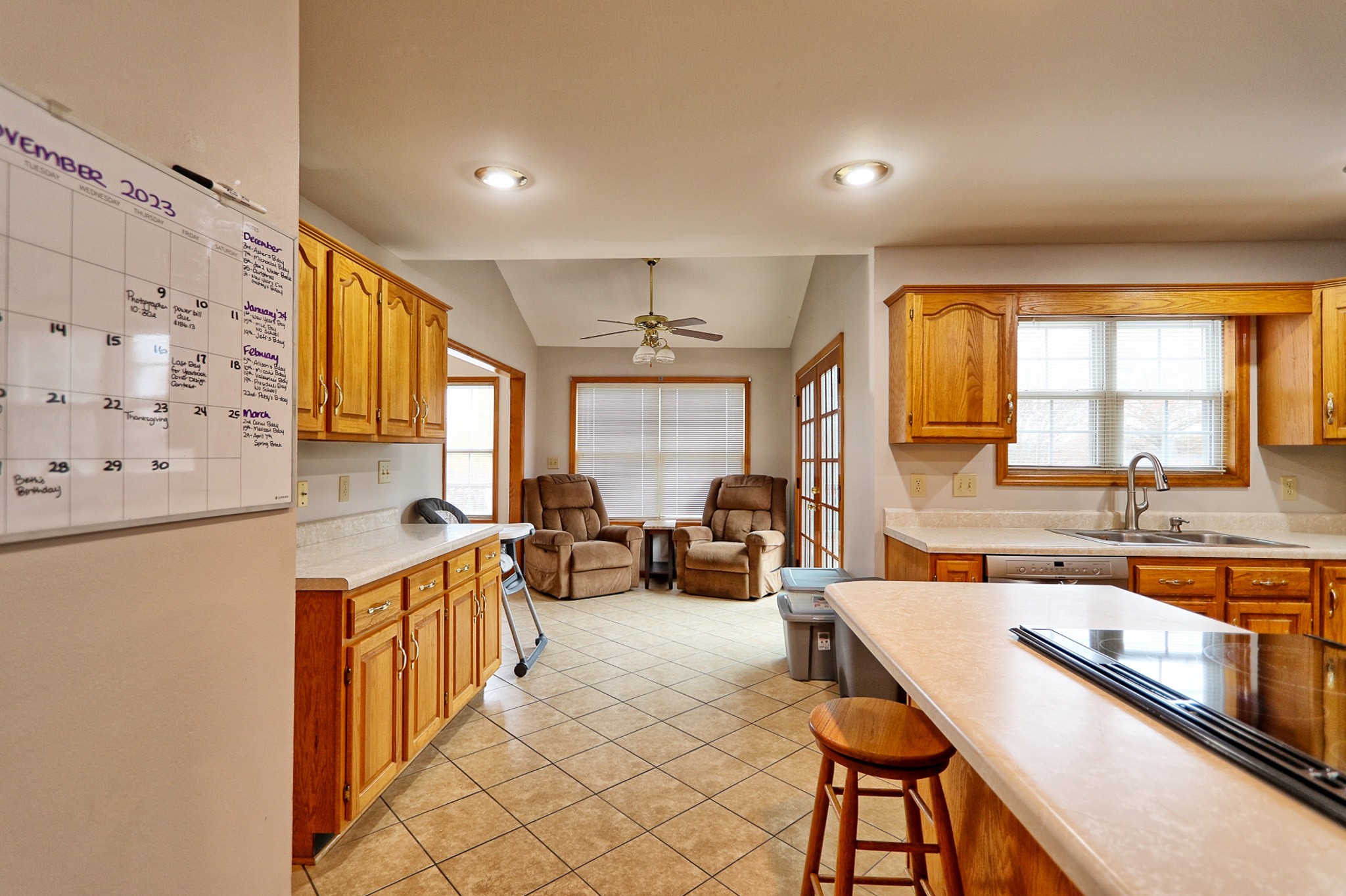 809 Nathan Drive Columbia, TN 38401 - Photo 15 of 41 a large living room with stainless steel appliances kitchen island granite countertop a sink and cabinets