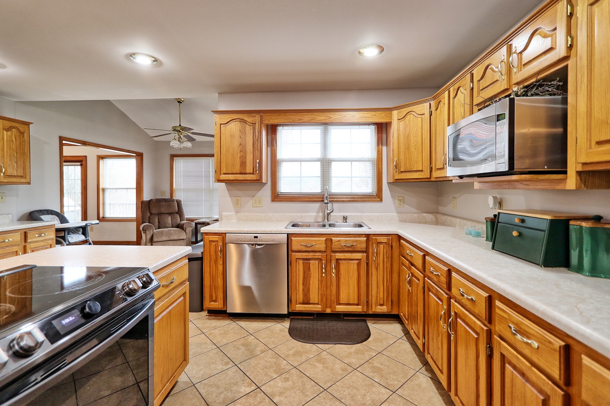 809 Nathan Drive Columbia, TN 38401 - Photo 17 of 41 a large kitchen with stainless steel appliances granite countertop a sink and a stove