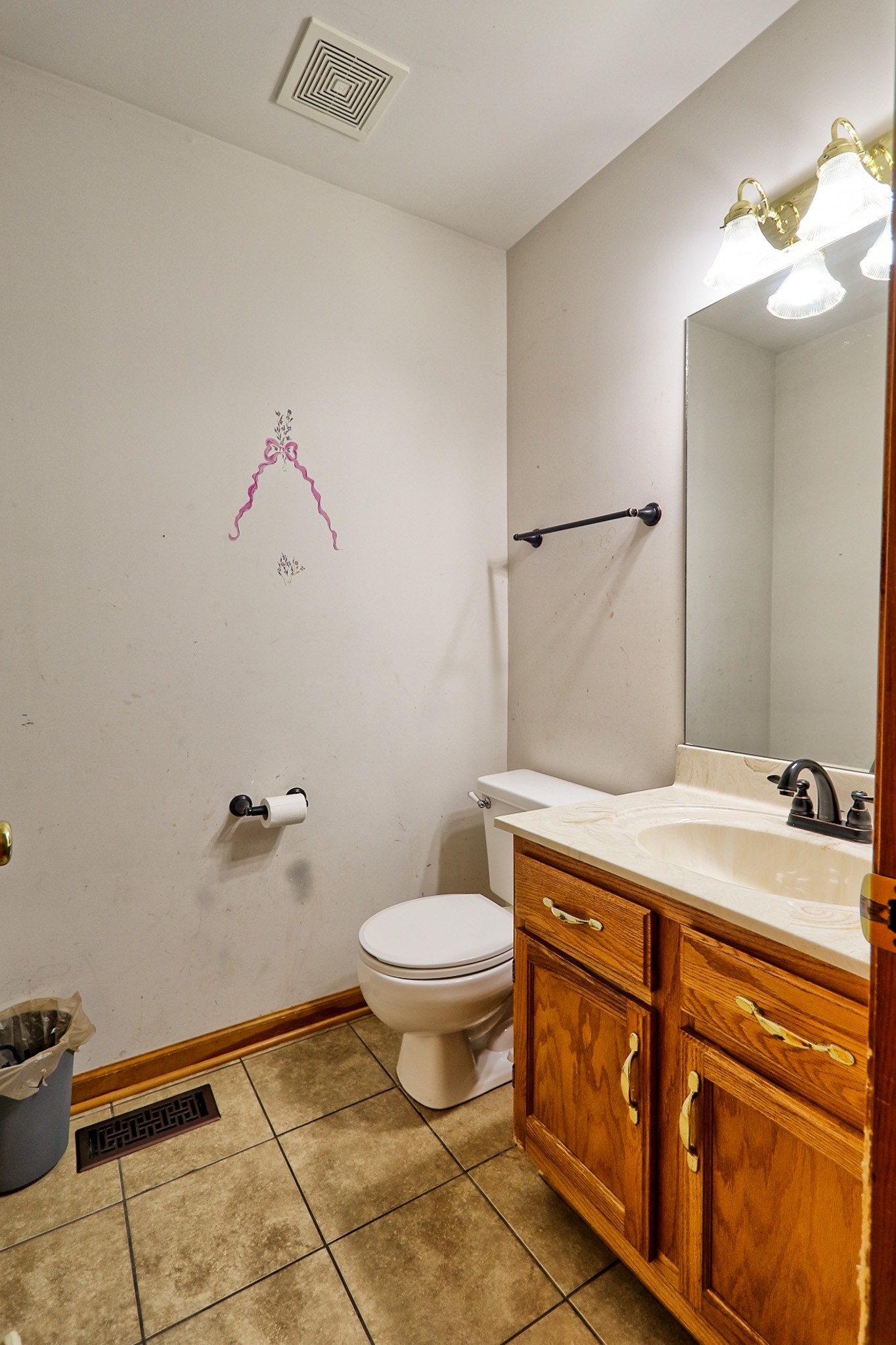 809 Nathan Drive Columbia, TN 38401 - Photo 22 of 41 a bathroom with a granite countertop toilet and a sink