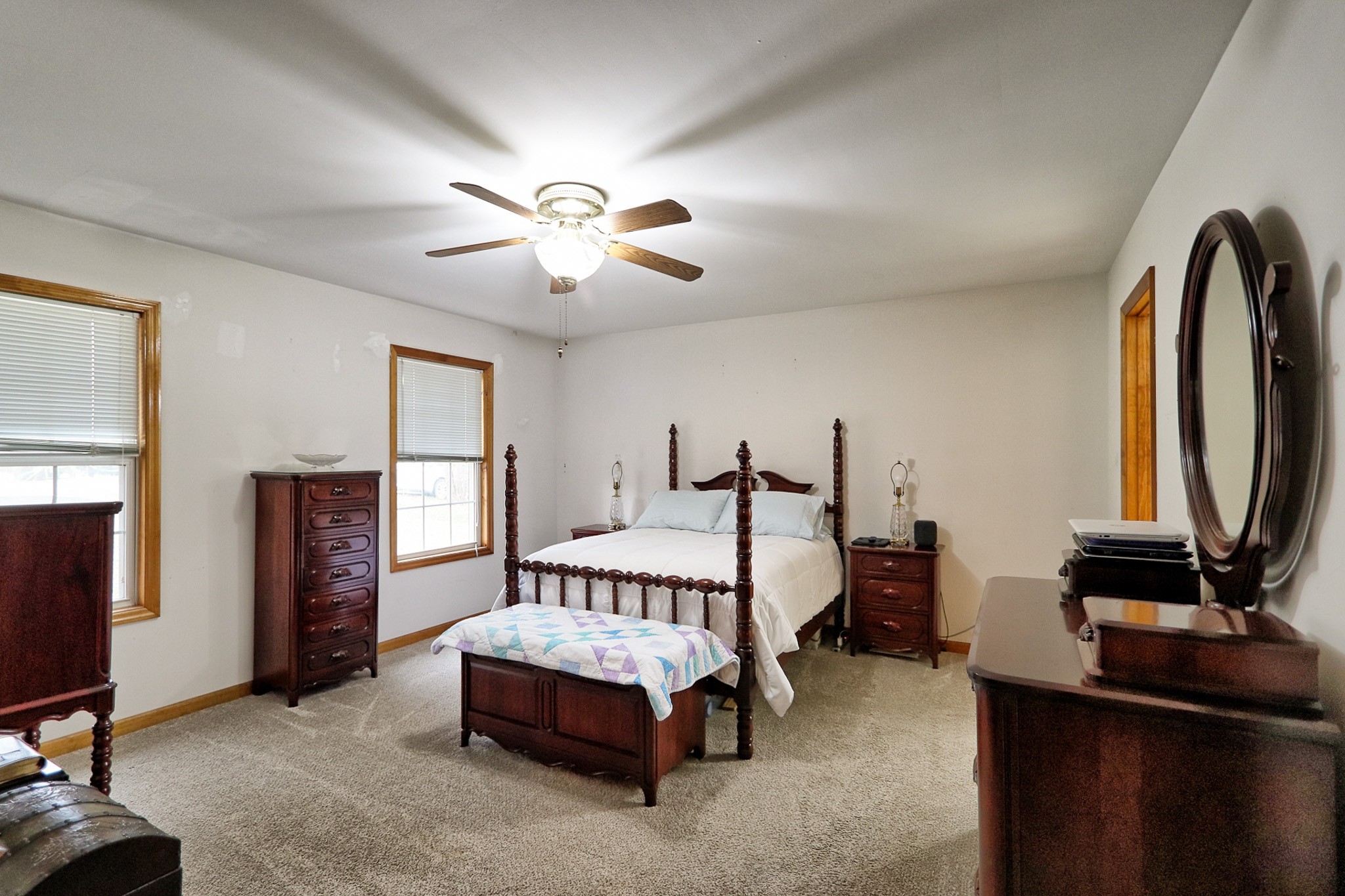 809 Nathan Drive Columbia, TN 38401 - Photo 8 of 41 a spacious bedroom with a bed and a chandelier