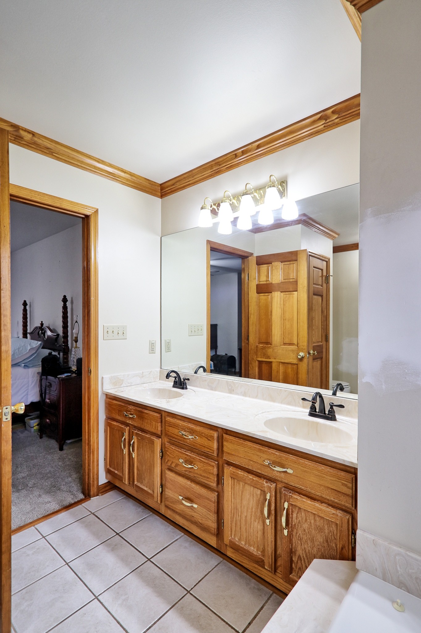 809 Nathan Drive Columbia, TN 38401 - Photo 10 of 41 a spacious bathroom with a double vanity sink and a mirror