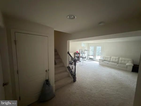 a living room with furniture and a couch