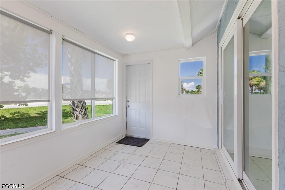 16595 Davis Road Fort Myers, FL 33908 - Photo 24 of 31 a view of an empty room and window