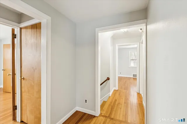 a view of bathroom with a tub and shower